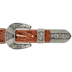 A custom western three piece belt buckle set featuring unique scrollwork and details